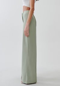 TUSSAH FREDA  - Hlače - sage green