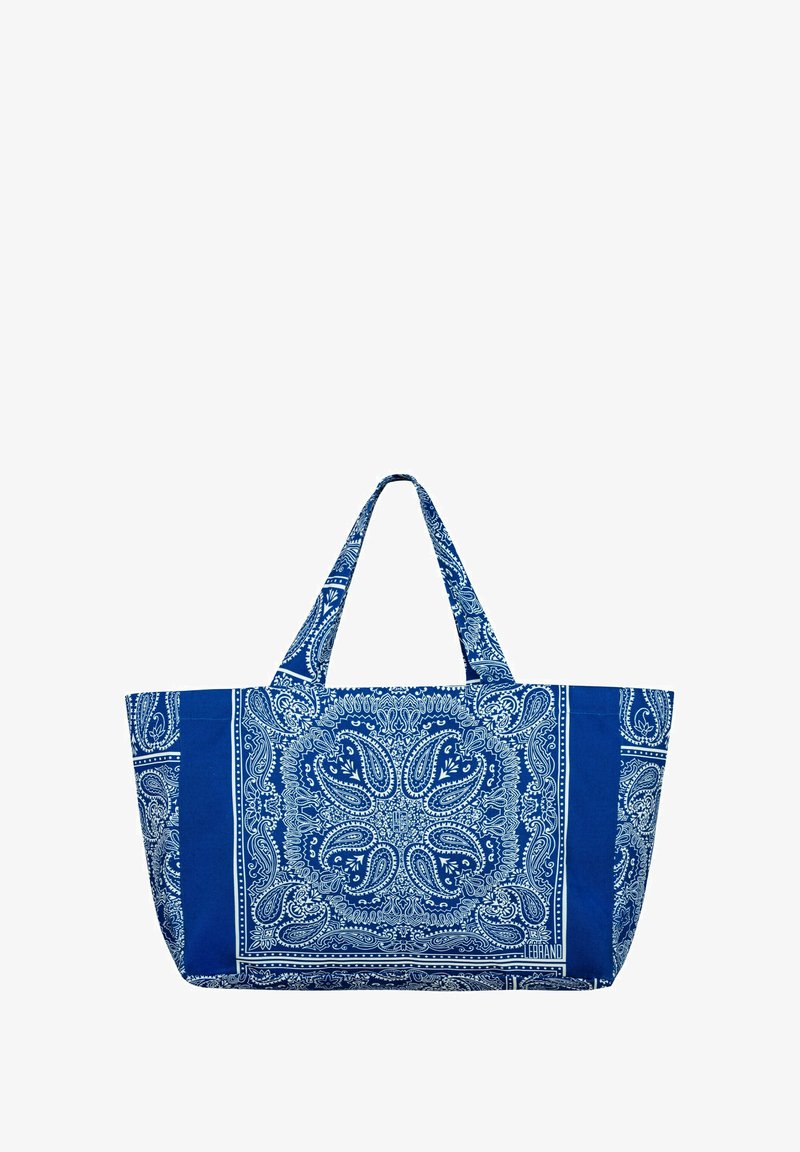 Niebieska torba materiałowa z wzorem paisley w białym kolorze. Posiada dwa uchwyty oraz dużą, otwartą komorę główną. Teksturowane wykończenie.