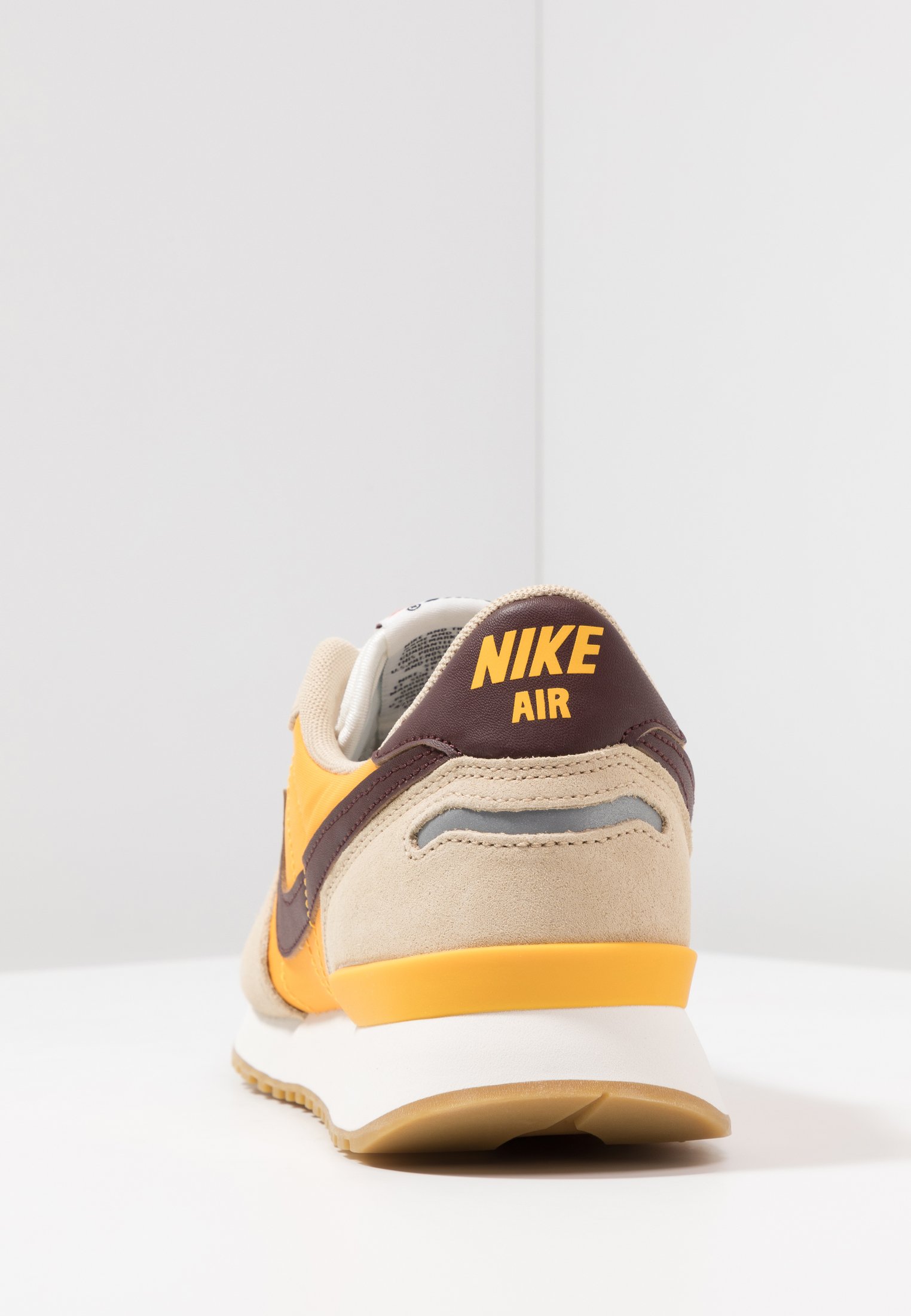 nike vortex desert ore