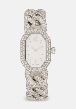 Silver octagonal watch with crystal accents and a braided band. Features a white dial with silver hands. Swiss made.