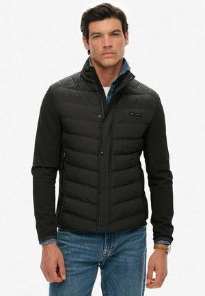 STORM POPPER - Chaqueta outdoor - black