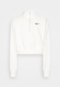 White cropped sweatshirt with a high collar, front zipper, and long sleeves. Features a small black Nike logo on the chest. Smooth texture.