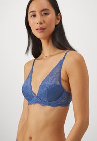 Calvin Klein Underwear LIGHT LINED PLUNGE SED COMFORT LOTUS - Liemenėlė su lankeliais - true navy