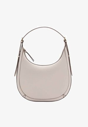 Light beige leather handbag with a curved silhouette, a single top handle, and minimal stitching. Features a zipper closure and side accents.