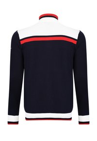 Tmavě modrý, bílý a červený svetr s dlouhým rukávem, ribkovaným límcem, manžetami a spodním lemem, se širokým pruhem napříč horní částí zad.