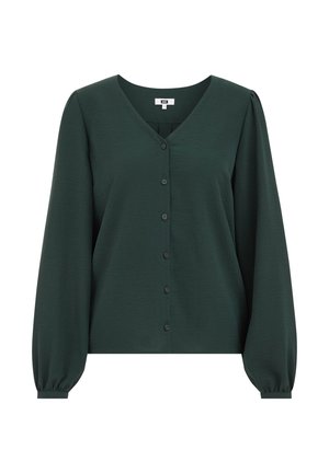 Blouse verte foncée à manches longues avec un col en V, fermeture à boutons sur le devant et manches ballons. Fabriquée dans un tissu lisse et texturé.