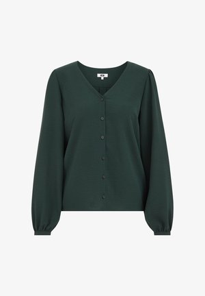Blouse verte foncée à manches longues avec un col en V, fermeture à boutons sur le devant et manches ballons. Fabriquée dans un tissu lisse et texturé.