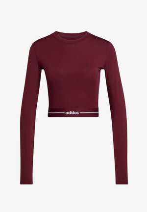 Top de manga larga corto en color burdeos hecho de tela suave, con una banda en la cintura con el logo blanco de Adidas y un escote redondo.