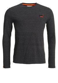 Pitkähihaine tummanharmaa paita, jossa on heather-kangas. Paidassa on oranssia korostusta rinnassa ja sisäkauluksessa, sekä pyöreä kaula-aukko.