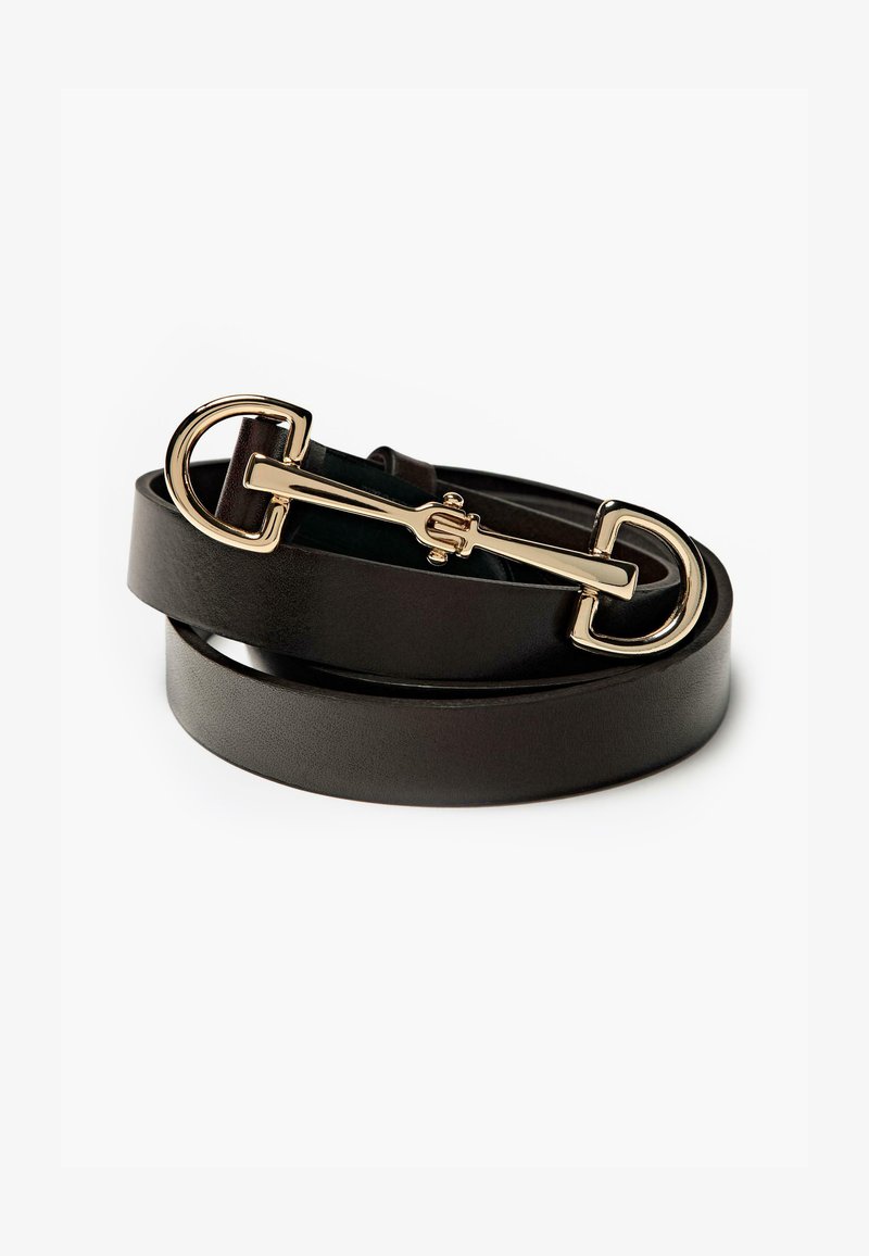 Black leather belt with a shiny gold buckle featuring a semi-circular design and a narrow strap. Smooth texture, minimalistic style.