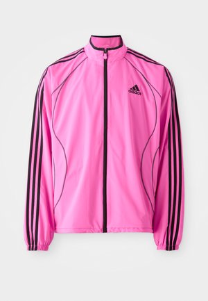Pink windbreaker jacket with black accents, features a high collar, front zipper, and three black stripes on each sleeve.