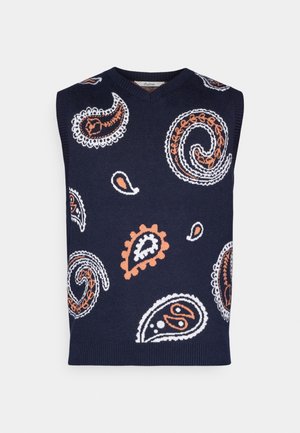 Laivastonsininen hihaton liivi, jossa on monimutkaiset valkoiset ja oranssit paisley-kuviot, neulottu rakenne ja V-kaulus.