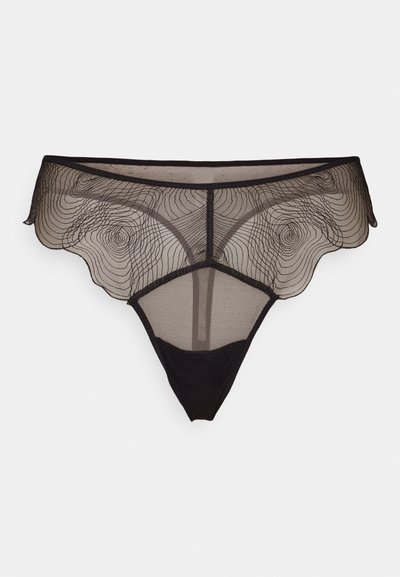 Black sheer thong with wavy lace detailing at the edges and geometric cutouts. Made of lightweight, translucent mesh fabric.