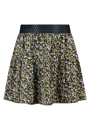 Sort nederdel med små gule, hvide og brune blomster, der har en tekstureret sort elastisk talje og sammensatte lag.