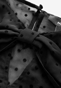 Next REGULAR FIT - BOW DETAIL SHEER - Bluse - black flocked spot