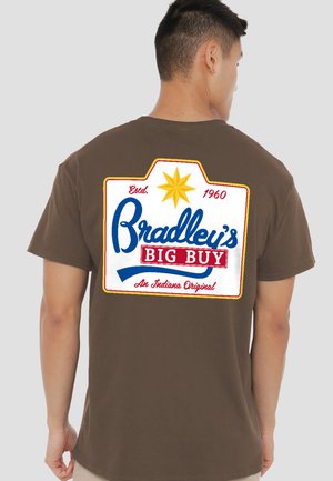 Brown cotton T-shirt featuring a colorful graphic on the back with "Bradley's Big Buy," established in 1960, and a yellow star accent.