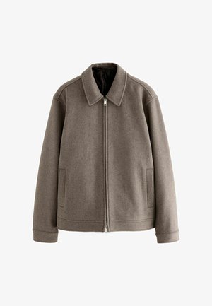 Jachetă dintr-un amestec de lână, de culoare brună, cu guler, închidere cu fermoar, buzunare laterale și o căptușeală netedă. Design simplu și finisaj texturat.