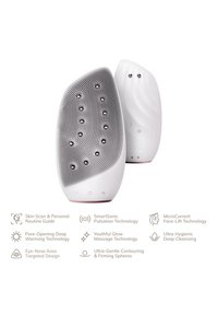 Appareil de nettoyage facial blanc doté d'une surface texturée avec de petites nodules doux, d'un design incurvé et d'une forme ergonomique pour une utilisation facile.