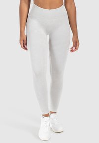 Leggings grigi chiari con un alto punto vita, tessuto morbido con un sottile motivo marmorizzato e un design aderente.