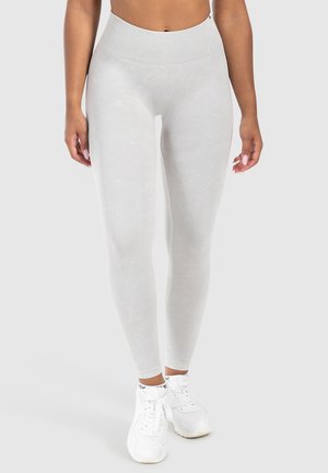 Leggings grigi chiari con un alto punto vita, tessuto morbido con un sottile motivo marmorizzato e un design aderente.