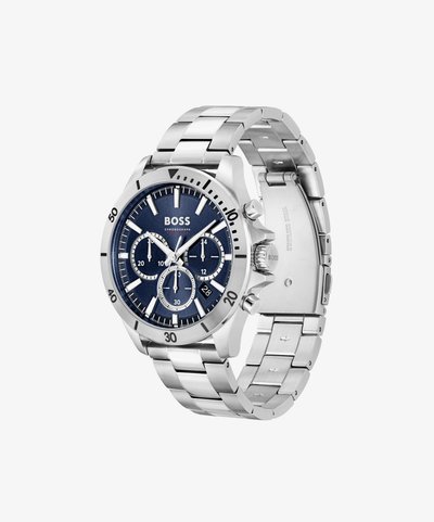 Montre chronographe en acier inoxydable argenté avec un cadran texturé bleu, trois sous-cadrans et affichage de la date à 6 heures. Bracelet en métal ajustable.
