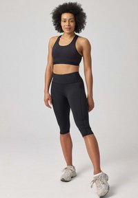 SNOCKS CAPRI - 3/4 sportbroek - schwarz