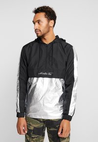 Mister Tee - REFLECTIVE WINDBREAKER - Windbreaker - black Thumbnail-Bild 1