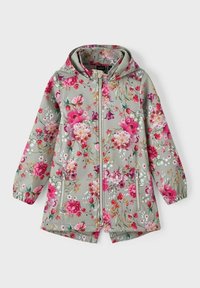 Blommig regnjacka i ljusgrått, med rosa och vita blommor. Dragkedja med sidofickor och huva. Strukturerat, vattenavvisande material.