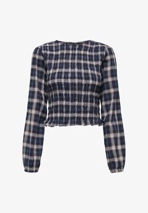 Jūras spēku un balta pārspalvas blūze ar garām piedurknēm, savilktu tekstūru un viļņotu apakšmalu. Iezīmē apļa kaklu un aizmugures aizdari.