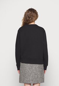 Guess ORIGINAL - Sudadera - jet black