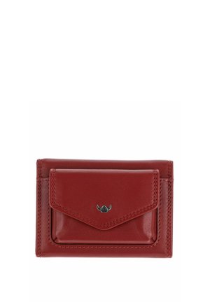 Compact red leather wallet with front flap pocket and small black metal logo emblem centered on pocket flap.