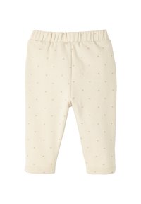 Cremfarbene Leggings mit einem elastischen Bund, die kleine, subtile Herzmuster aufweisen. Hergestellt aus weichem, dehnbarem Stoff.