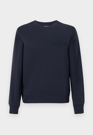 Felpa blu navy realizzata in cotone morbido con scollatura rotonda, polsini e orlo a costine. Presenta un logo ricamato sul petto.