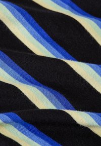 Knitted fabric featuring bold horizontal stripes in varying shades of blue, black, and light green, with a soft texture and smooth finish.