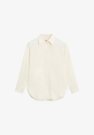 White button-up shirt made of textured fabric, featuring a standard collar, long sleeves, and a rounded hem with a relaxed fit.