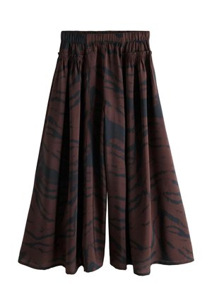 Hnedé široké culottes vyrobené z ľahkej tkaniny, s čiernym abstraktným vzorom, s elastickým pásom pre pohodlné nosenie.
