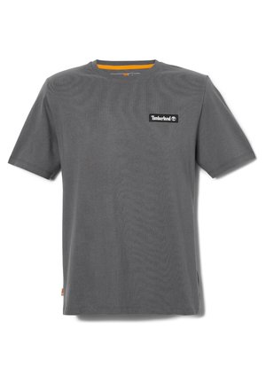 Dark gray short-sleeve crew neck Timberland t-shirt with logo patch on the left chest and orange interior neck trim.