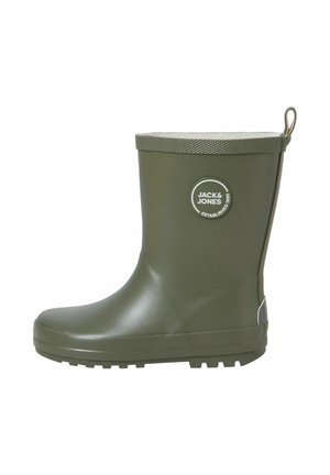 Stivale da pioggia in gomma verde con un bordo testurizzato a contrasto e una toppa con logo. Presenta una suola piatta con scanalature per una migliore aderenza e un risvolto per facilitare la calzata.
