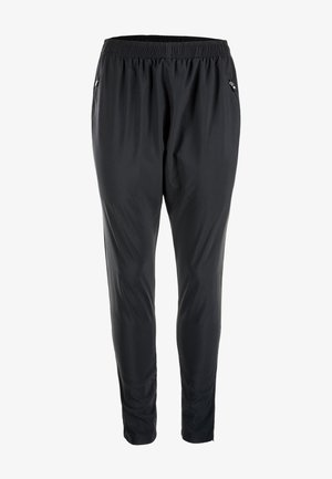 Sorte træningsbukser med elastisk talje, lynlås-lommer på siden og en let, glat stof. Tapered fit med et minimalistisk design.