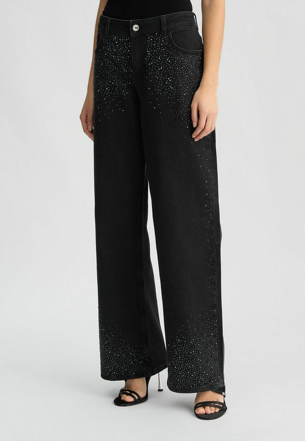 WITH RHINESTONES - Flared Jeans