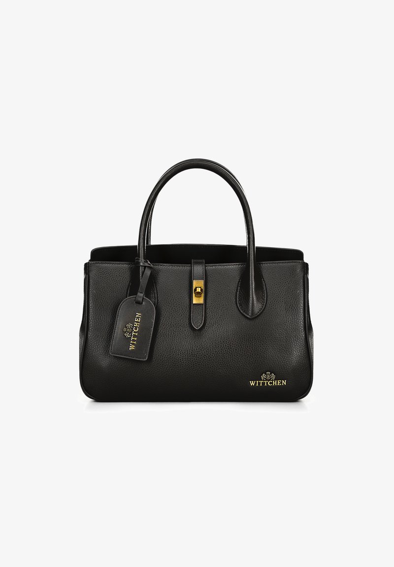Zwarte leren handtas met een gestructureerde afwerking, ronde handvatten, een gouden sluiting en een afneembare tag. Merkennaam "WITTCHEN" in goud gegraveerd.