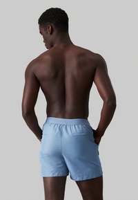 Calvin Klein Swimwear MEDIUM DRAWSTRING - Zwemshorts - faded denim