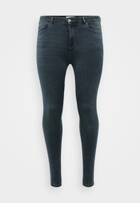 Dark blue skinny jeans made of denim, featuring a traditional five-pocket design, button and zipper closure, and a smooth texture.