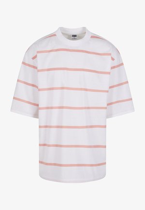 Valkoinen lyhythihainen t-paita, jossa on vaaleanpunaisia vaakaraitoja, pyöreä pääntie sekä rento malli, joka on valmistettu sileästä kankaasta.