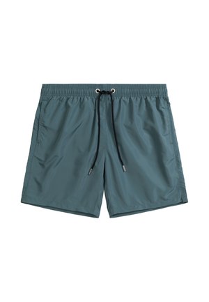 Turkusowe szorty kąpielowe wykonane z lekkiego, gładkiego materiału. Posiadają elastyczny pas z czarnym sznurkiem i boczne kieszenie. Prosty design.