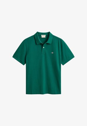 Grøn bomulds polo med korte ærmer og klassisk krave. Har en lille logo på venstre bryst. Glat tekstur, afslappet design.