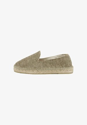 Scarpa espadrilla in tessuto intrecciato beige con punta affilata, suola in juta naturale e elastico laterale per una vestibilità perfetta. Design semplice e piatto.
