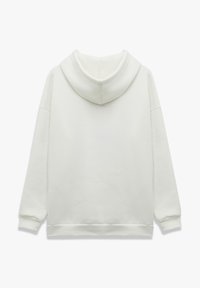 Sudadera blanca con capucha, de textura suave, con hombros caídos y puños acanalados. Presenta una capucha espaciosa y un corte relajado.