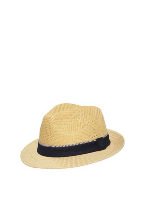 Beige woven straw fedora hat with a black fabric band featuring a white zigzag pattern along the edge.
