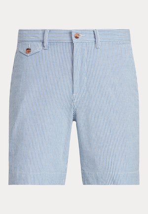 Short homme bleu clair et blanc à rayures verticales, taille avec boutons et petite patte de poche boutonnée sur le côté gauche.